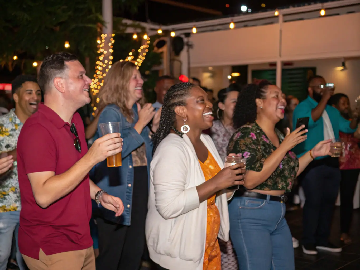 A photograph of a community dance event, showing people of all ages and backgrounds participating in a fun and inclusive dance activity, set in a public space with a lively atmosphere.